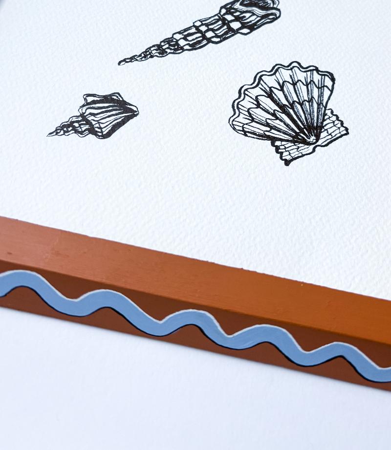 SCATTERED SHELLS ORIGINAL INK ARTWORK IN A HAND PAINTED TAN AND BLUE PRELOVED FRAME