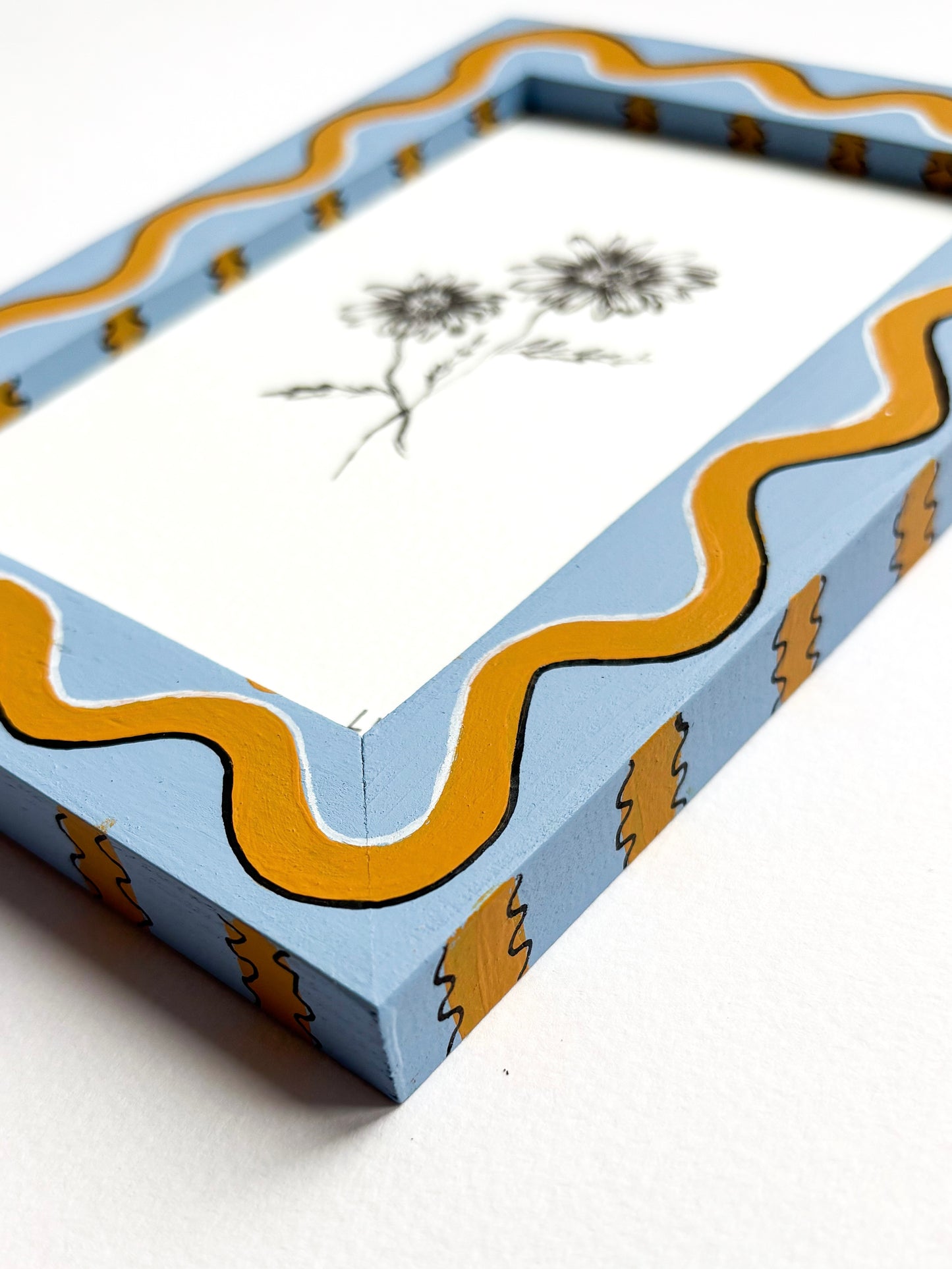 DAISY ORIGINAL INK ARTWORK IN A HAND PAINTED BLUE AND MUSTARD WIGGLE AND STRIPED PRELOVED FRAME
