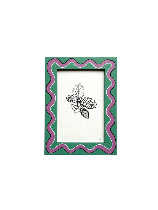 STRAWBERRY ORIGINAL INK ARTWORK IN A HAND PAINTED GREEN AND PURPLE WIGGLE AND STRIPED PRELOVED FRAME